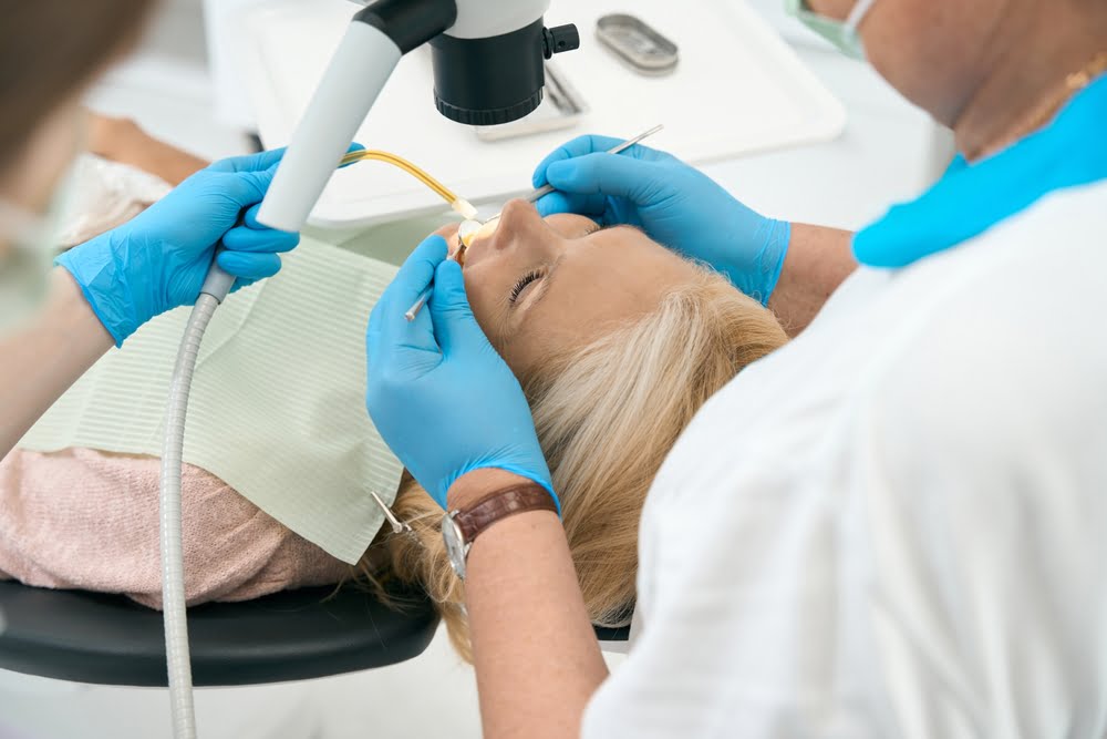 A dental patient at the dentist having a dental check up - Dental Cleaning in Atlanta, GA