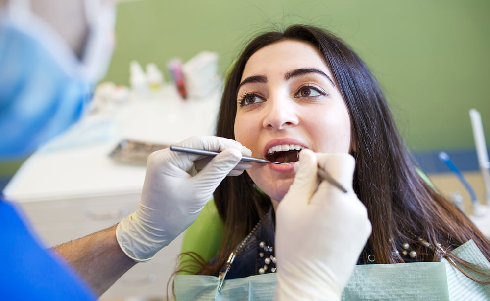 A dental patient at the dentist - Dental Cleaning in Atlanta, GA