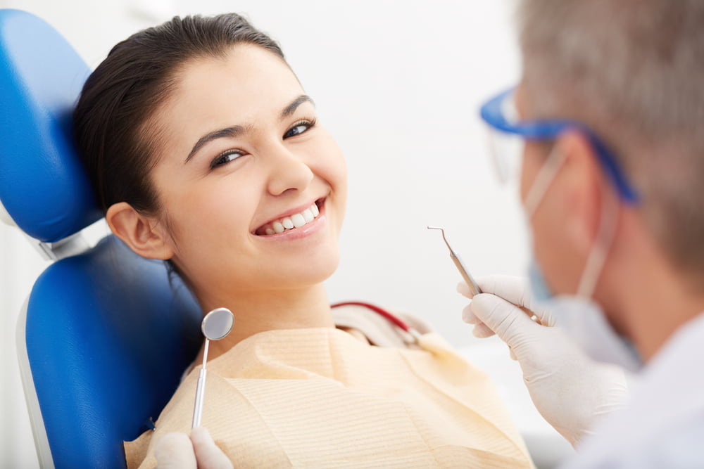 A woman at the dentist - Holistic Dentistry